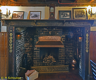 Fireplace in Right-Hand Bar.  by Michael Schouten. Published on 